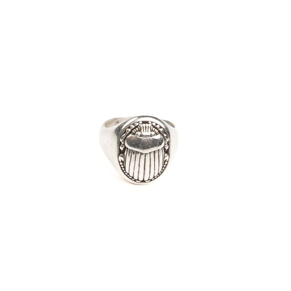 Sterling silver signet ring with engraved scarab design.