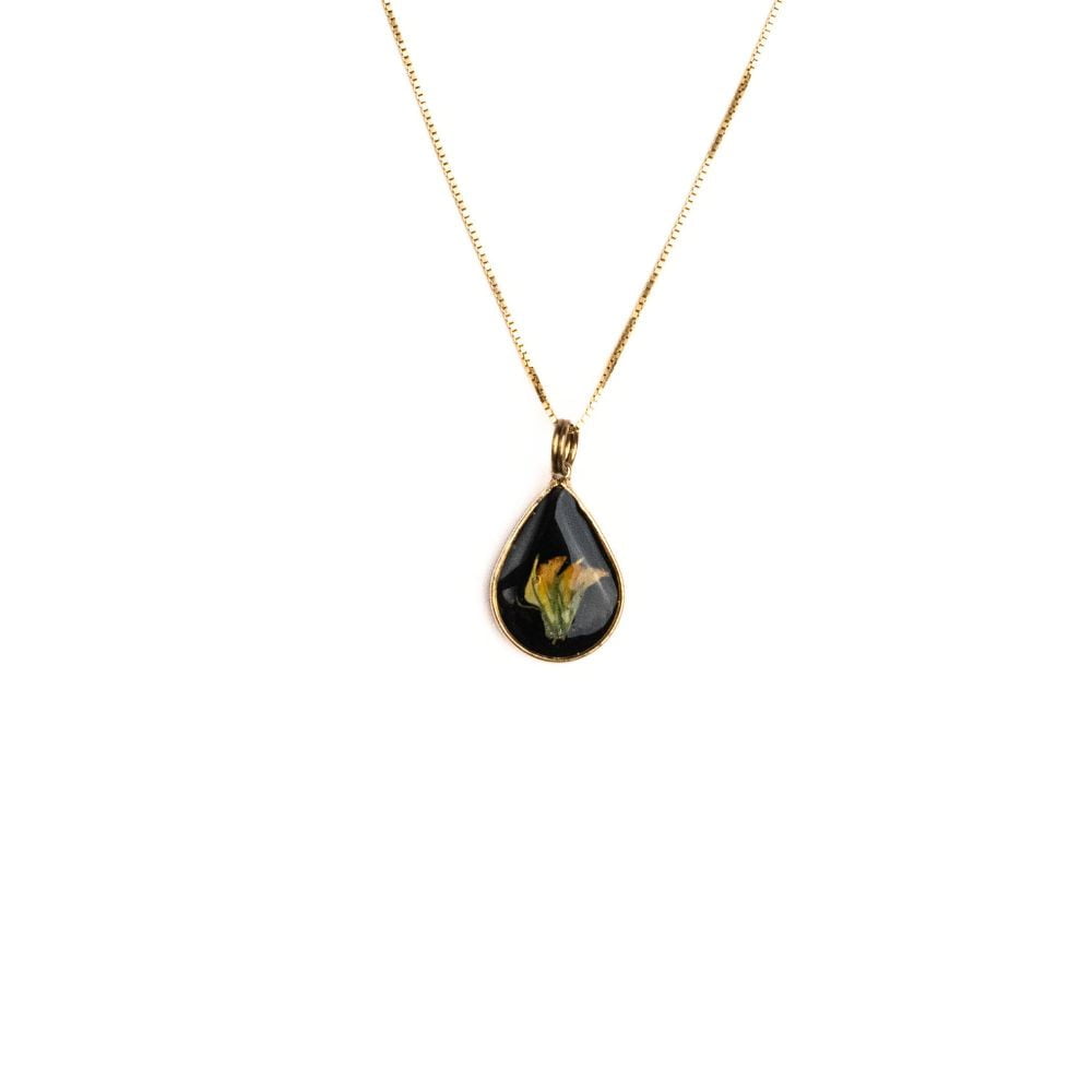 Gold teardrop pendant necklace with real wild pea flower from Cape Town set in resin on a gold plated sterling silver chain.