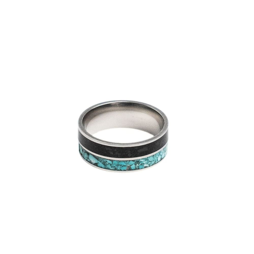 Stainless steel ring with turquoise stone inlay and black stone accent band.