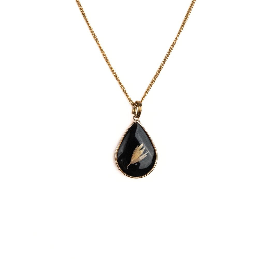 Gold teardrop pendant necklace with real Cape Town grass seeds set in resin on a gold plated sterling silver chain.