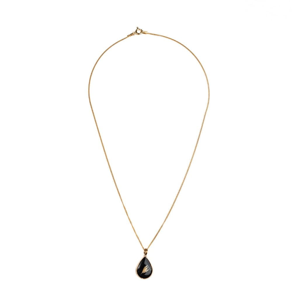 Gold teardrop pendant necklace with real Cape Town grass seeds set in resin on a gold plated sterling silver chain.