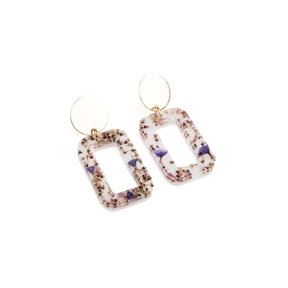 Rectangular resin statement earrings with pink erica and sea lavender flowers, gold plated brass disc studs and sterling silver posts.