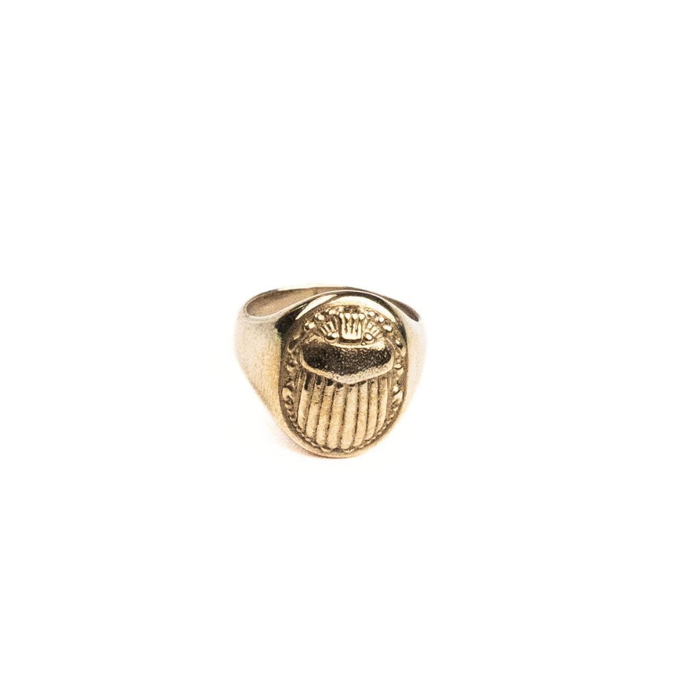 Solid brass scarab signet ring with engraved beetle detail.