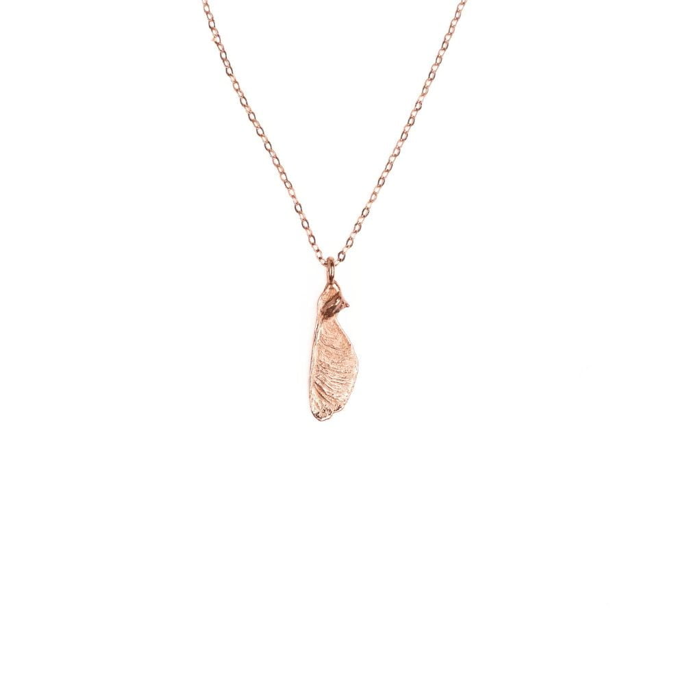 Rose gold maple seed necklace on sterling silver chain.