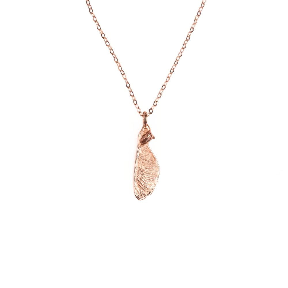 Rose gold maple seed necklace on sterling silver chain.