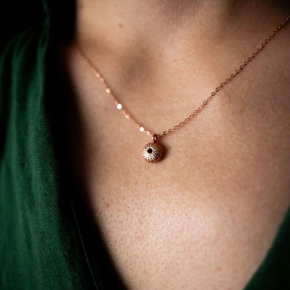 Rose gold plated sterling silver necklace with real sea urchin pendant found in Nature’s Valley.