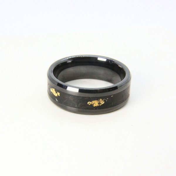 Black zirconium ring with agate inlay and 24K gold flakes.