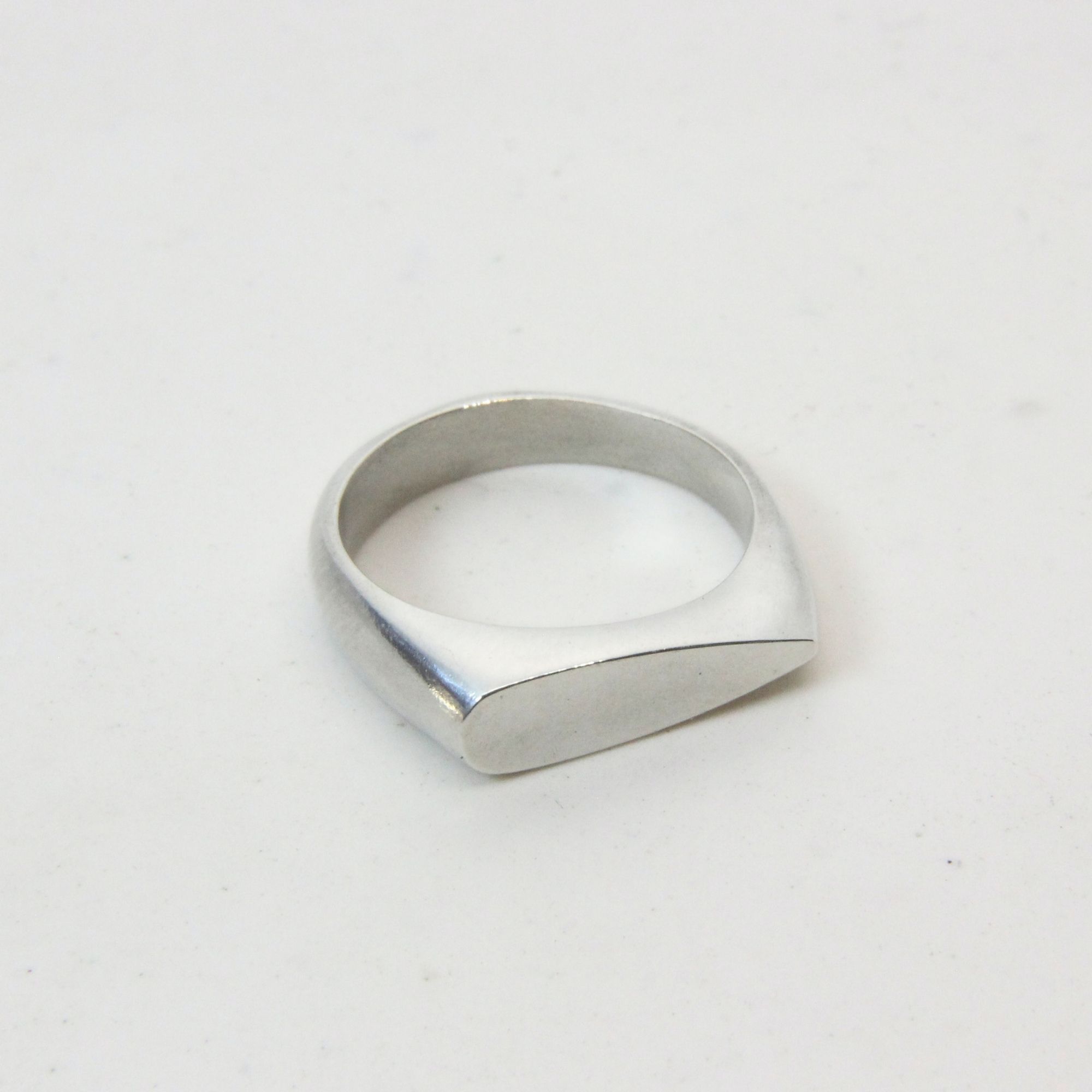 Sterling silver drop shape signet ring.