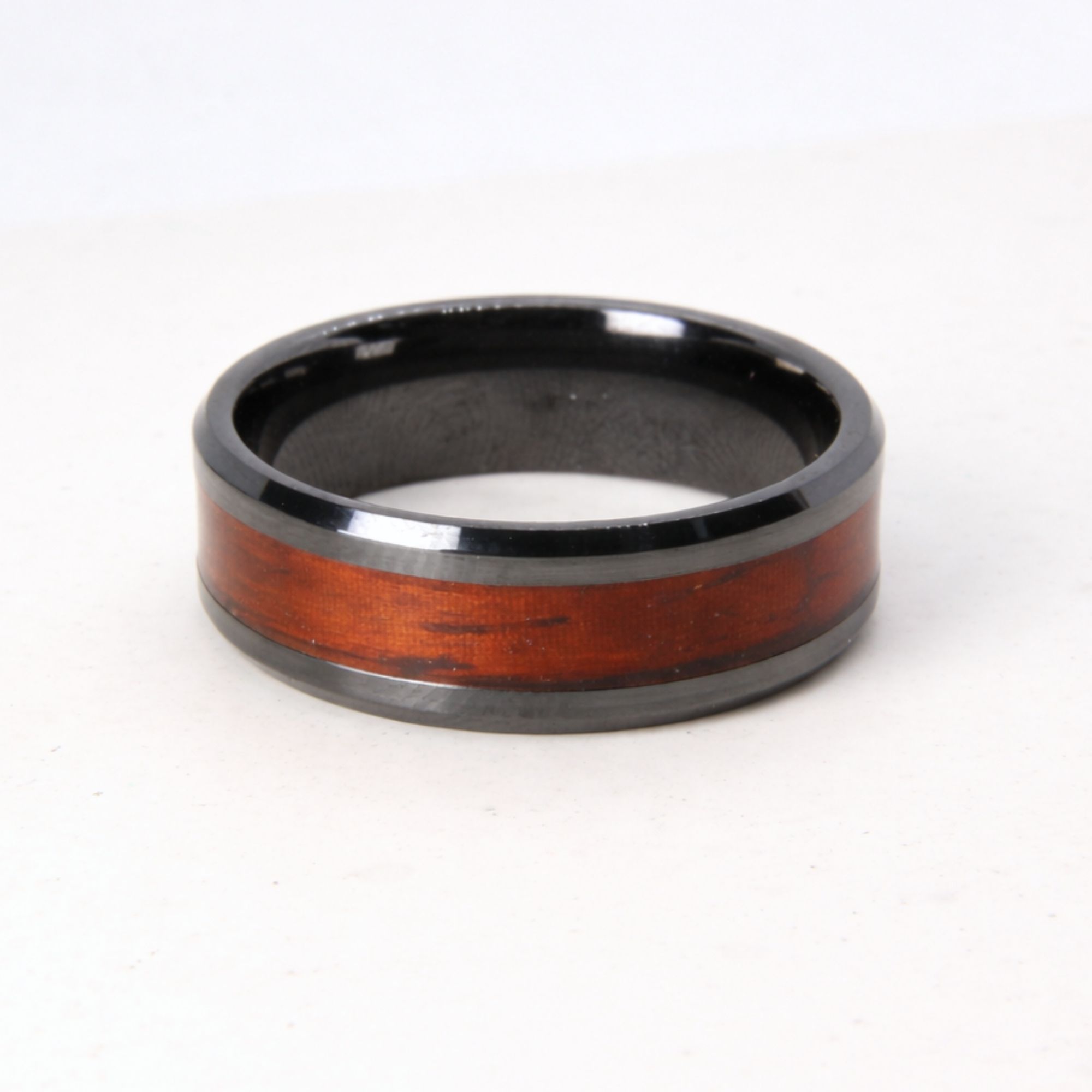 Black zirconium ring with rosewood inlay.