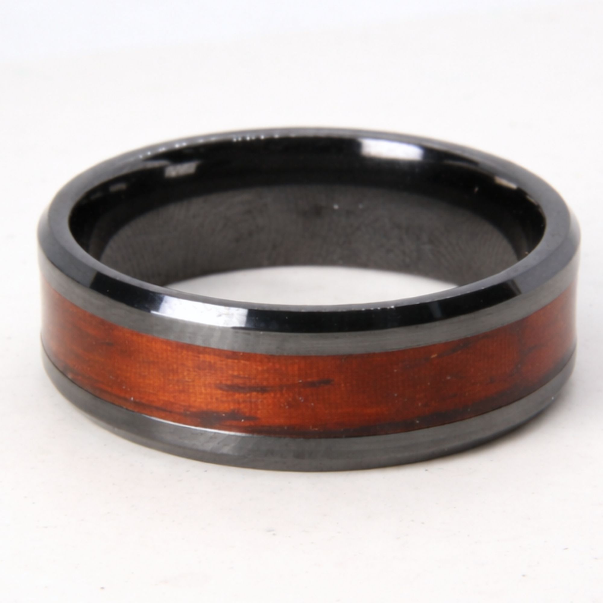 Black zirconium ring with rosewood inlay.