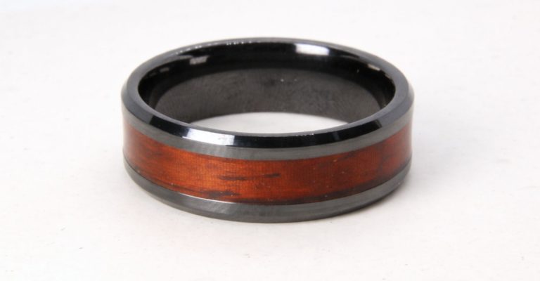 Black zirconium ring with rosewood inlay.